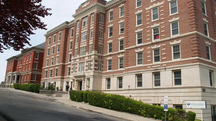 The red brick exterior of Community Healthlink at 12 Queen Street in Worcester. 